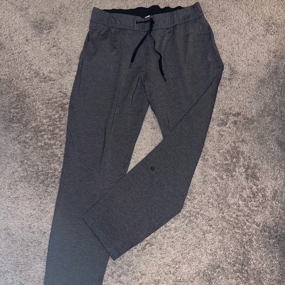 Lululemon stretch high rise pant 7/8th length dark grey. Size 10.